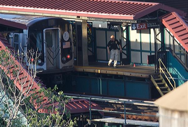 Police probe Brooklyn subway shooting. 