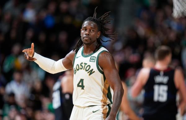 Jrue Holiday celebrating after hitting a three pointer.